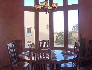The dining room is semi-circular and has lots of light and a good view.