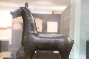 Bronze horse covered in designs