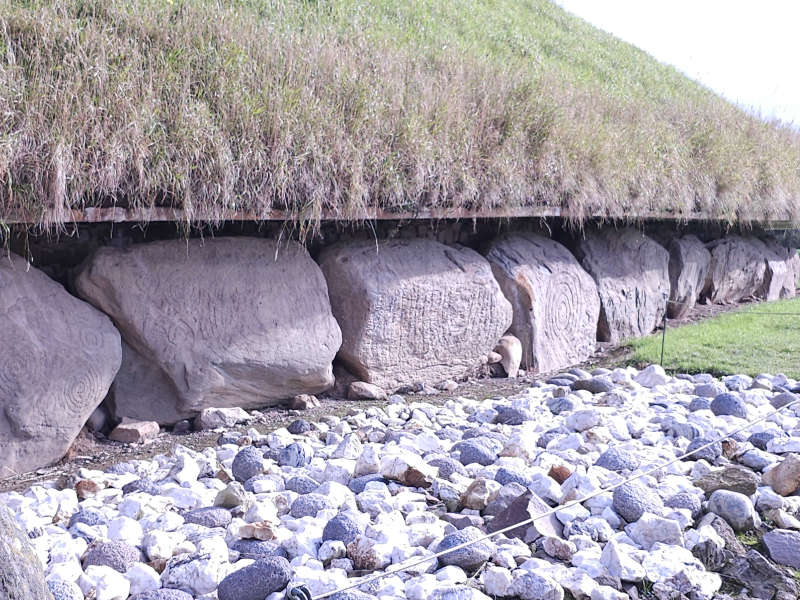 At the front of the passage grave at Knowth. Different kinds of rocks, like these river rocks, were used for different purposes.