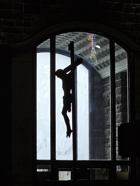 silhouette of a crucifix at the Galway Cathedral