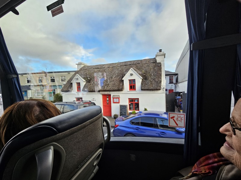 Traditional thatched roof. Red door keeps evil away.