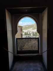 View of Granada from Moorish window in the Nasrid Palaces