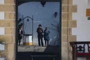 Us, reflected in a window at Bodegas Tradición