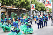Noisy, colorful parade on Calle Larga