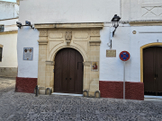 The façade of this chapel, on Plaza Nuestro Padre Jesús de la Sagrada Cena reads 1467