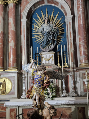 The full setting of Michael casting out Satan. Brilliant colors!
