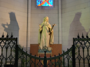 Sculpture with 2 shadows in cathedral