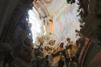 There is a window that lets the morning light in at a very  high place in the apse.  (the far east end)