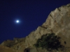 The moon near carved dwellings