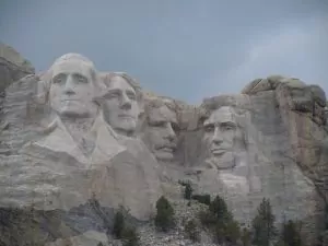 Mt. Rushmore against a dark sky