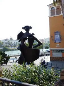 Juan Belmonte, famous bullfighter looking across the river to the bullfight ring