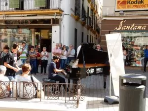 Piano playing for a benefit in a square close to us.