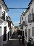 A street in Grazalema. Note the iron bars on the window. They are there more to indicate wealth than for protection.
