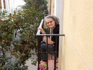 Patricia on one of our balconies watching tourists learn about Cervantes.